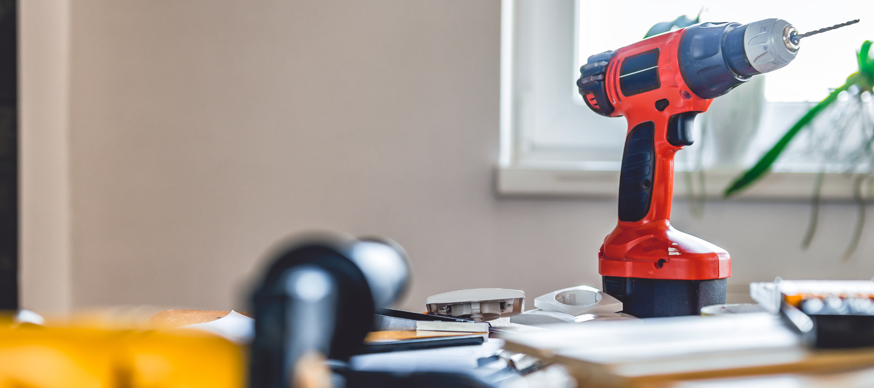 Power tools spread across a counter.